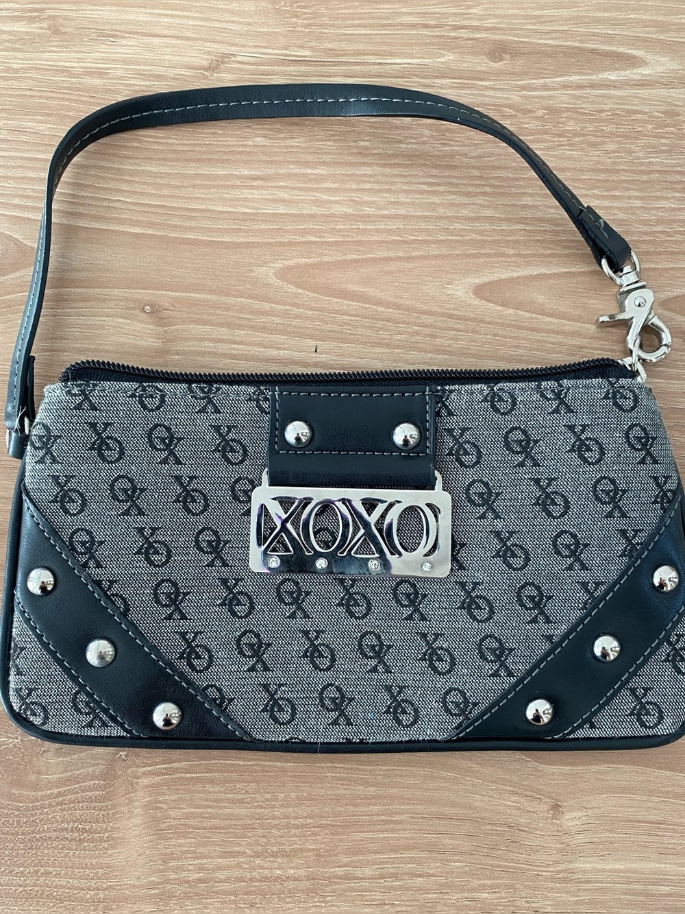 XOXO Black and Gray Logo Jacquard Wristlet with Metal Plaque